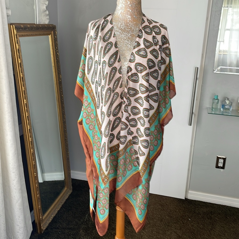 Poncho New with tags. One Size